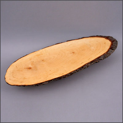 Holzbrett oval mit Rinde L/B 80x28 cm